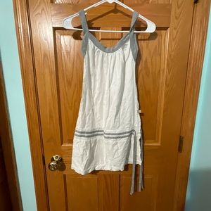 Cute white dress with a grey ribbon to tie around.